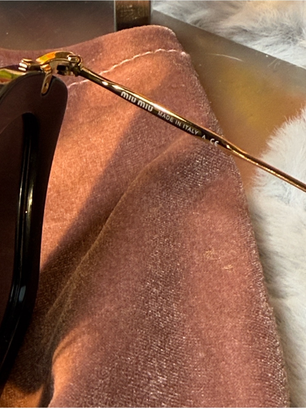 Miu Miu Black Cat-Eye Sunglasses with Gold Trim - Picture 4 of 12